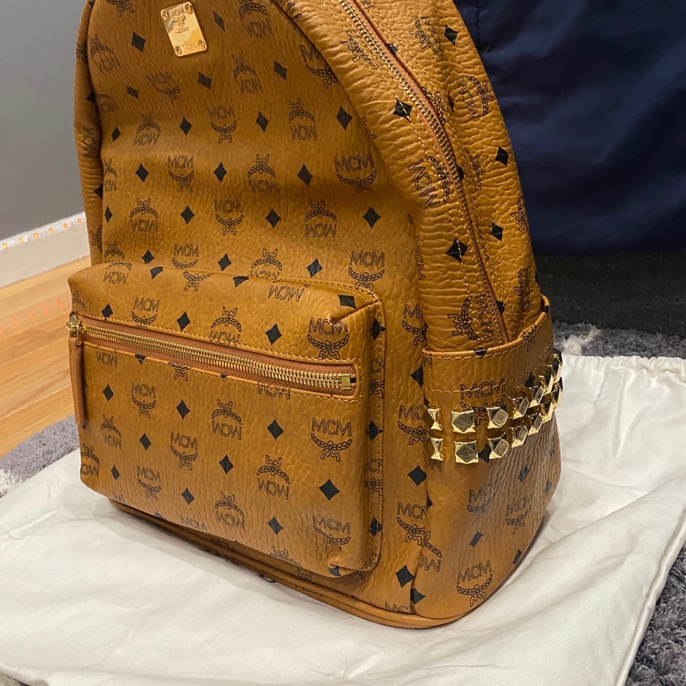 Authentic MCM backpack unisex Color cognac